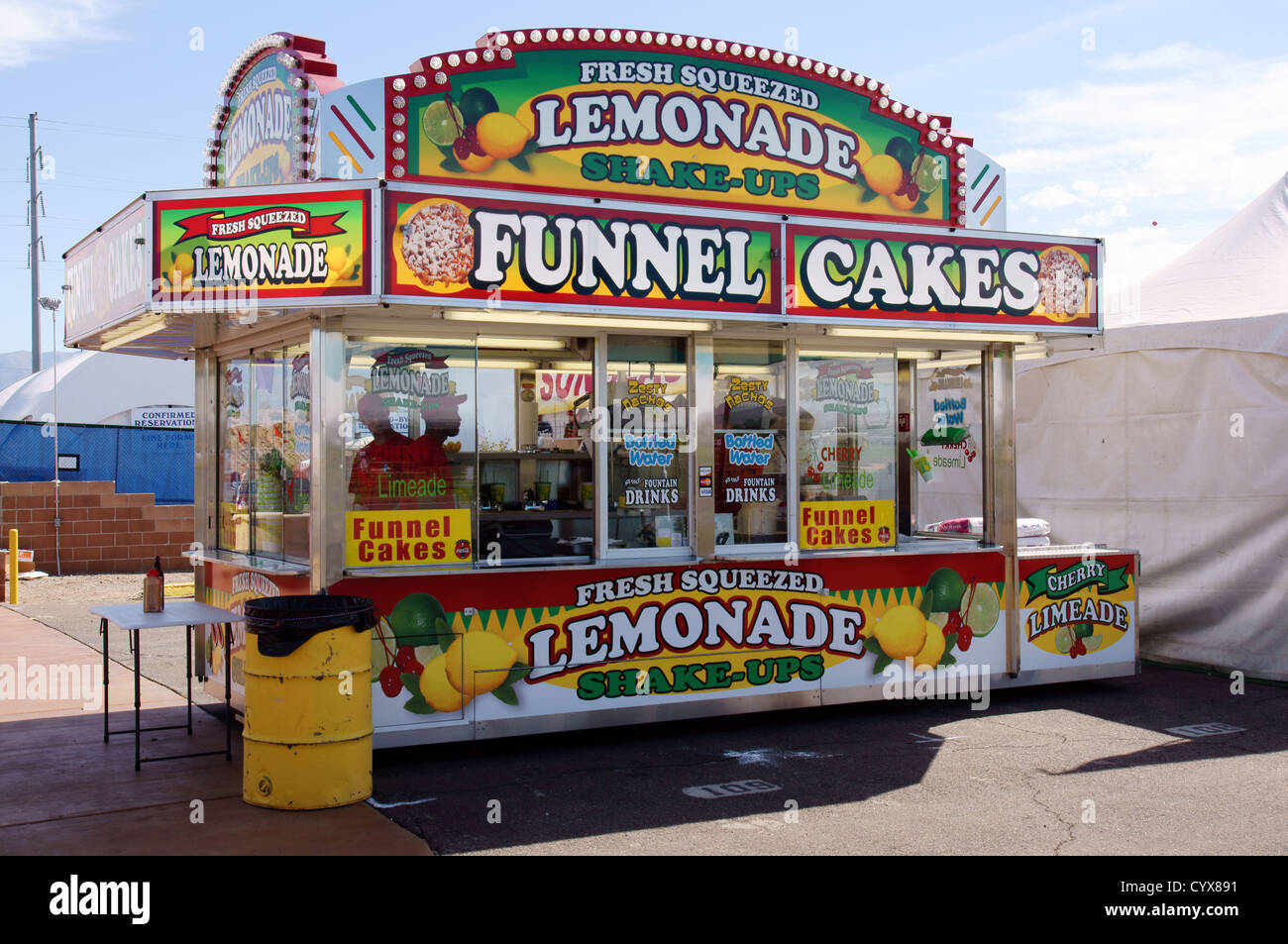 Stock Photo - funnel cakes lemonade display vendor sell selling ...