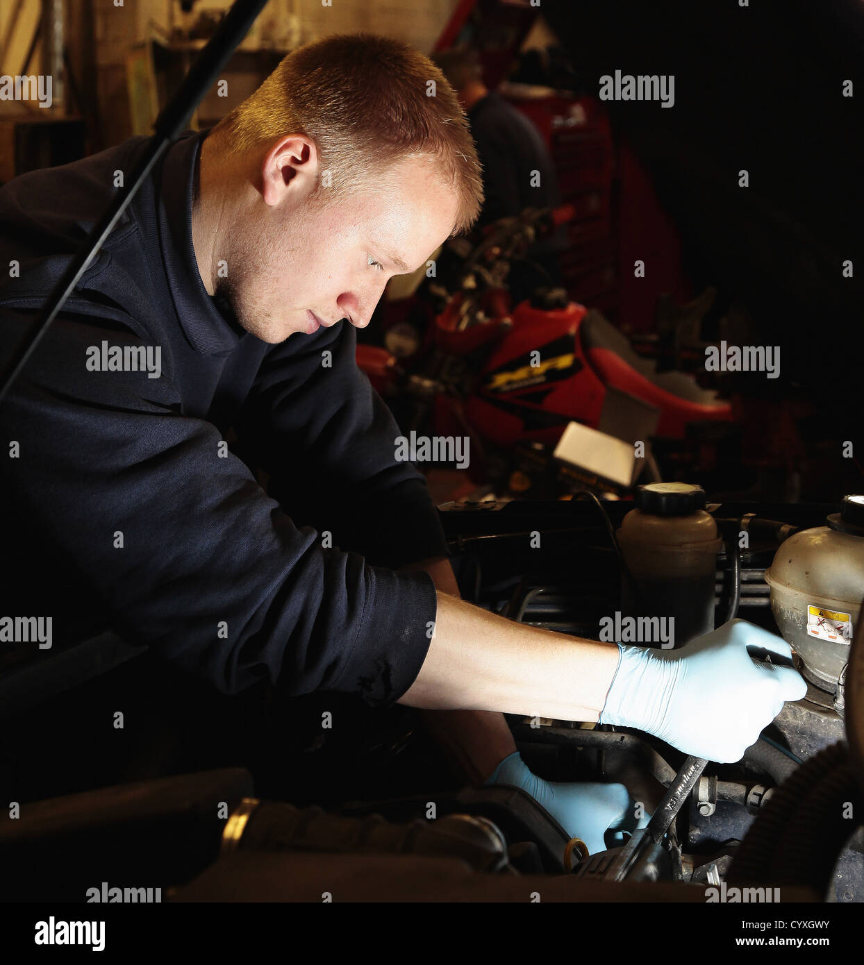 Repair Mechanic Working On Car In Garage Auto Automobile Automobiles