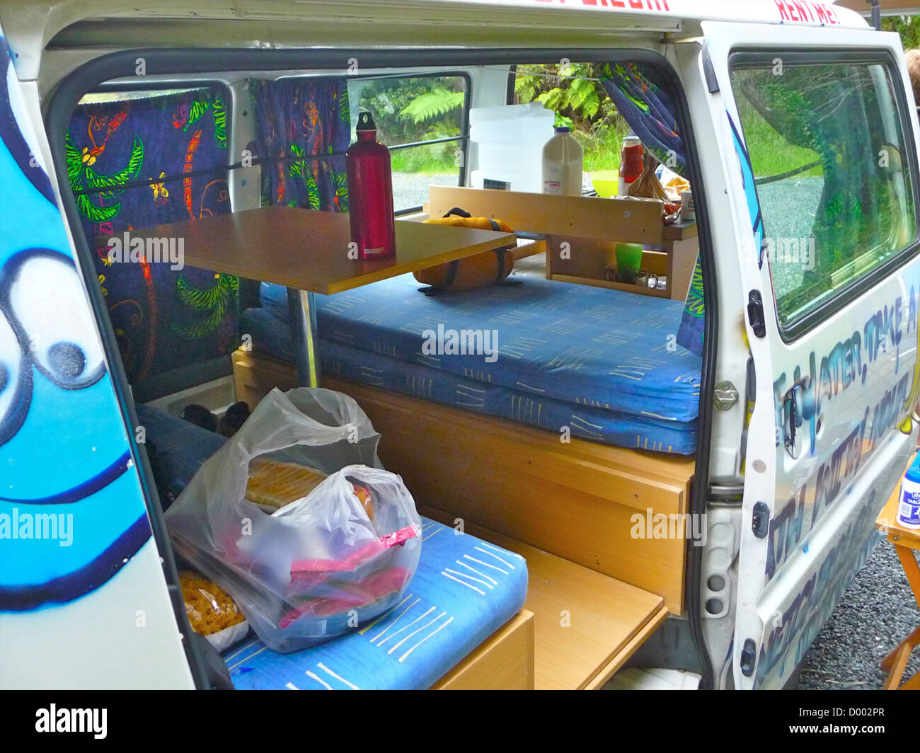 Students gap year travel camper van campervan New Zealand Wicked Stock Photo, Royalty Free Image