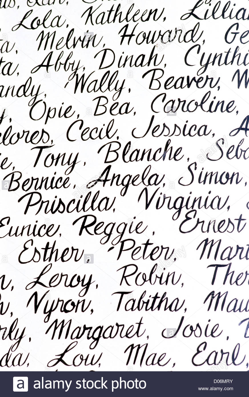 worksheet In Cursive white background with people names written in cursive handwriting stock photo handwriting