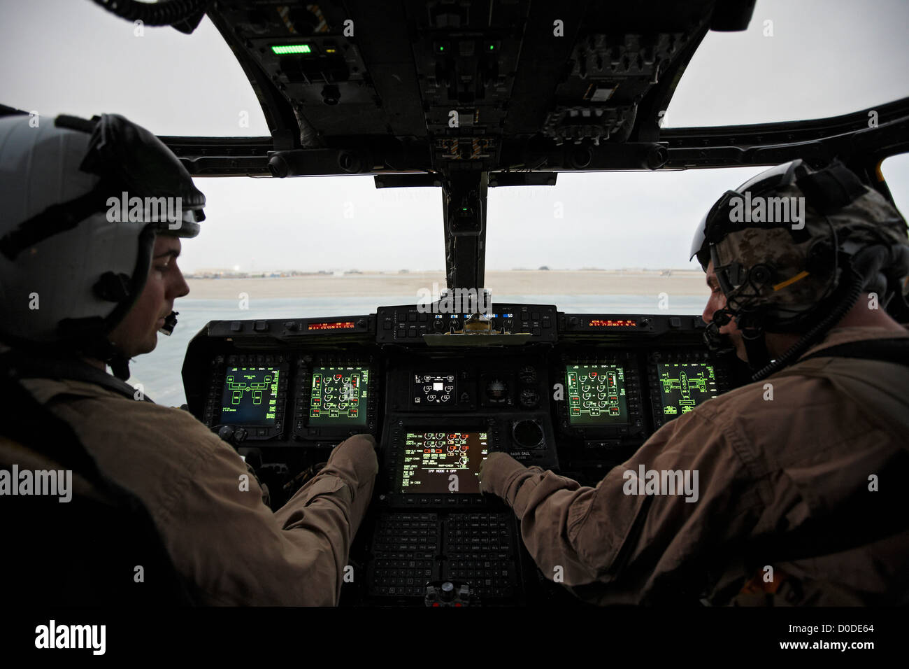 U.S. Marine Corps aviators in cockpit MV22 Osprey during combat Stock