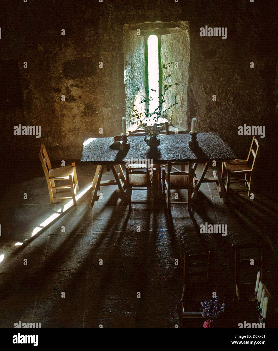 ballyportry castle corofin co clare ireland. interior with table ballyportry castle corofin co clare ireland. interior with table