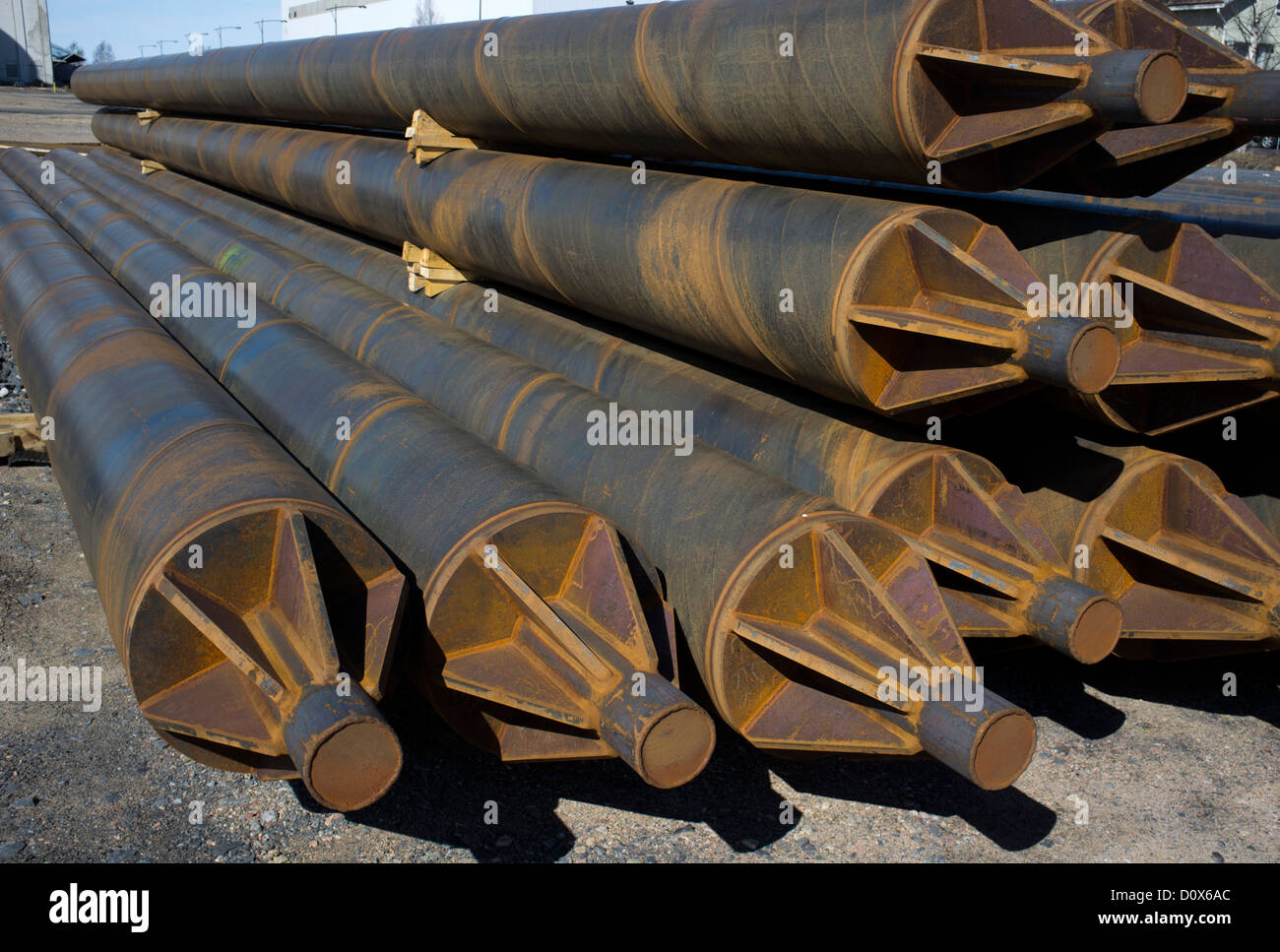 Pile of round hollow steel stilts , used in construction work Stock