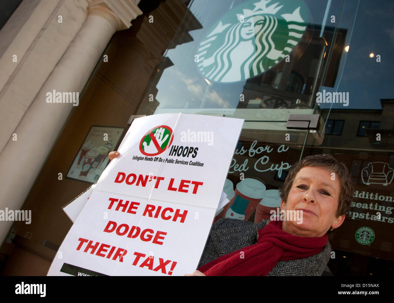 UK Uncut activists protest against Starbucks tax avoidance outside