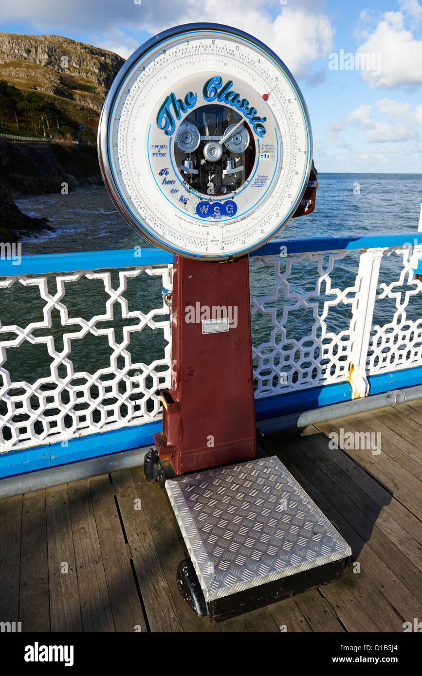The Classic Coin Operated Weighing Scales On Llandudno Pier Wales UK Stock Photo, Royalty Free