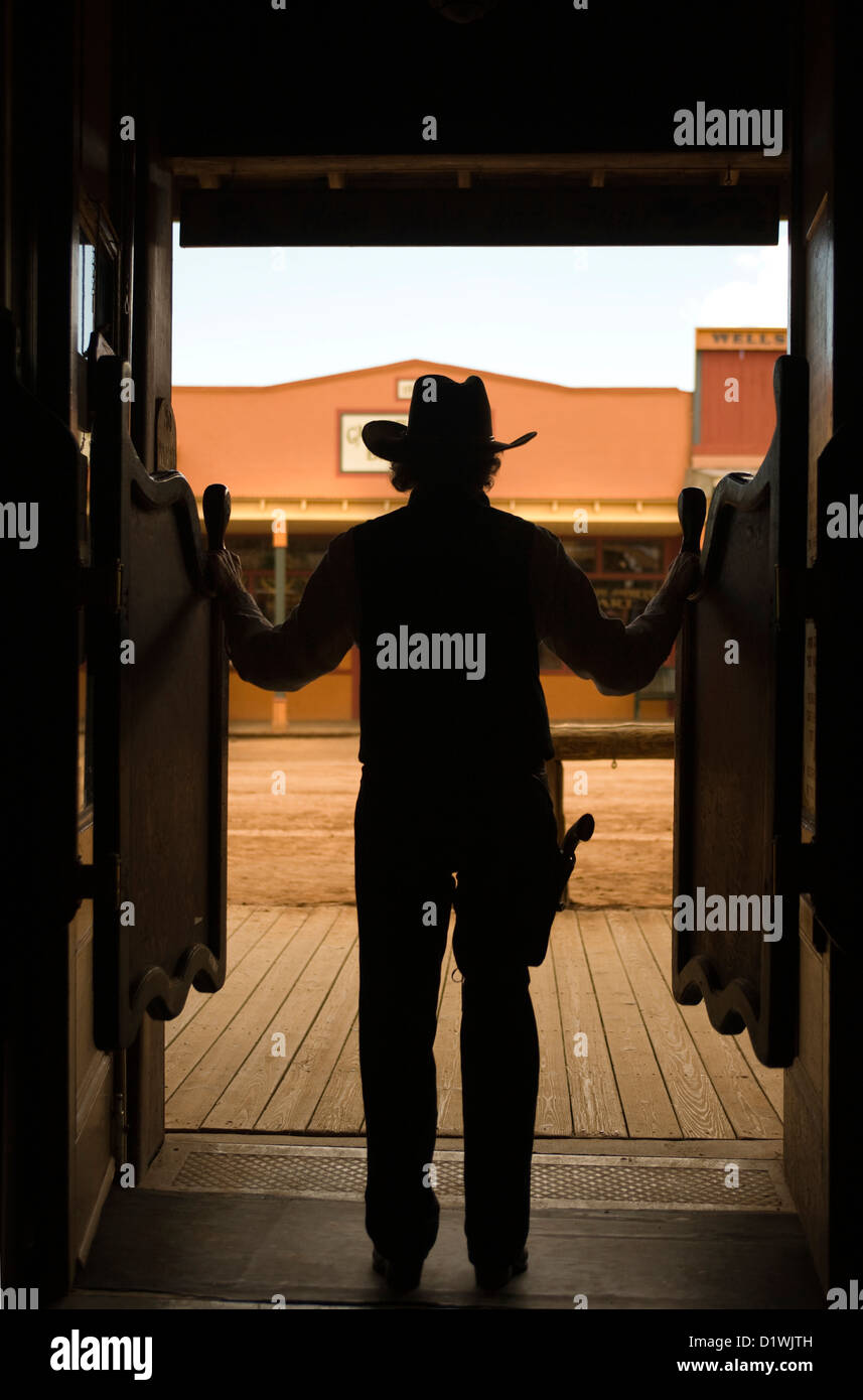 COWBOY STANDING IN DOORWAY OF SALOON ALLEN STREET TOMBSTONE COCHISE