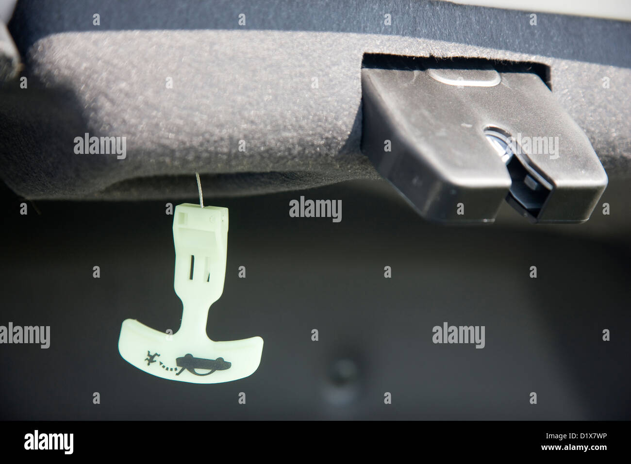 Emergency boot or trunk release pull cord Stock Photo, Royalty Free