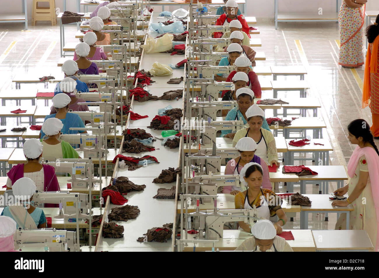Readymade Garment Factory Interior People Working On Sewing Machine