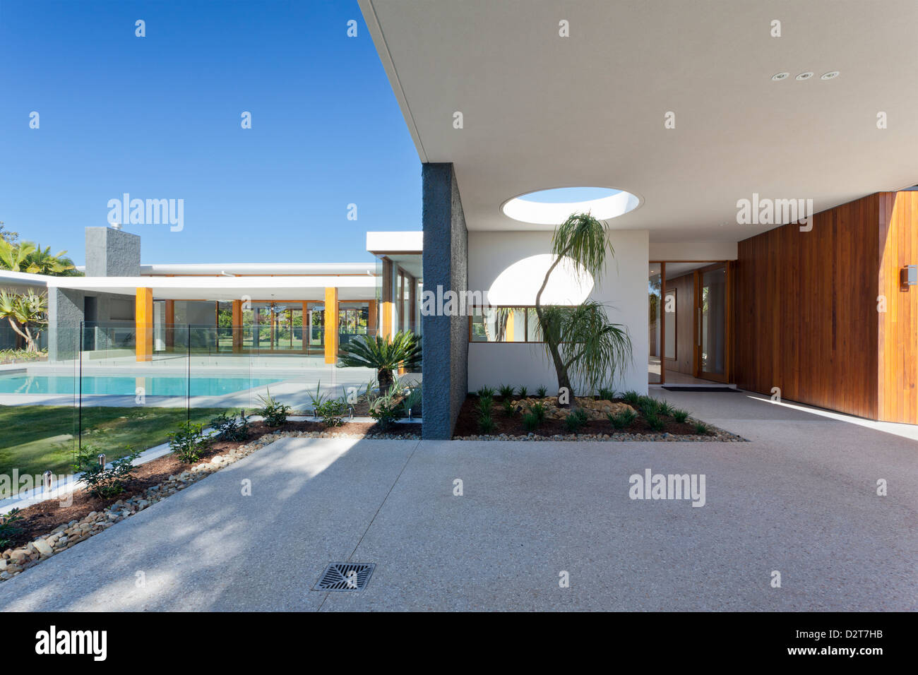 Modern backyard with swimming pool in Australian mansion Stock Modern backyard with swimming pool in Australian mansion Stock
