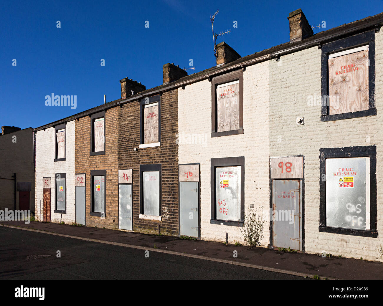 Terraced houses boarded up and awaiting demolition, Burnley, England
