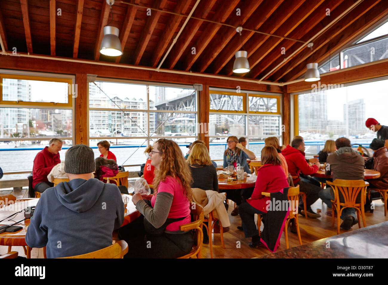 busy waterfront cafe in granville island public market Vancouver BC Stock Photo, Royalty Free