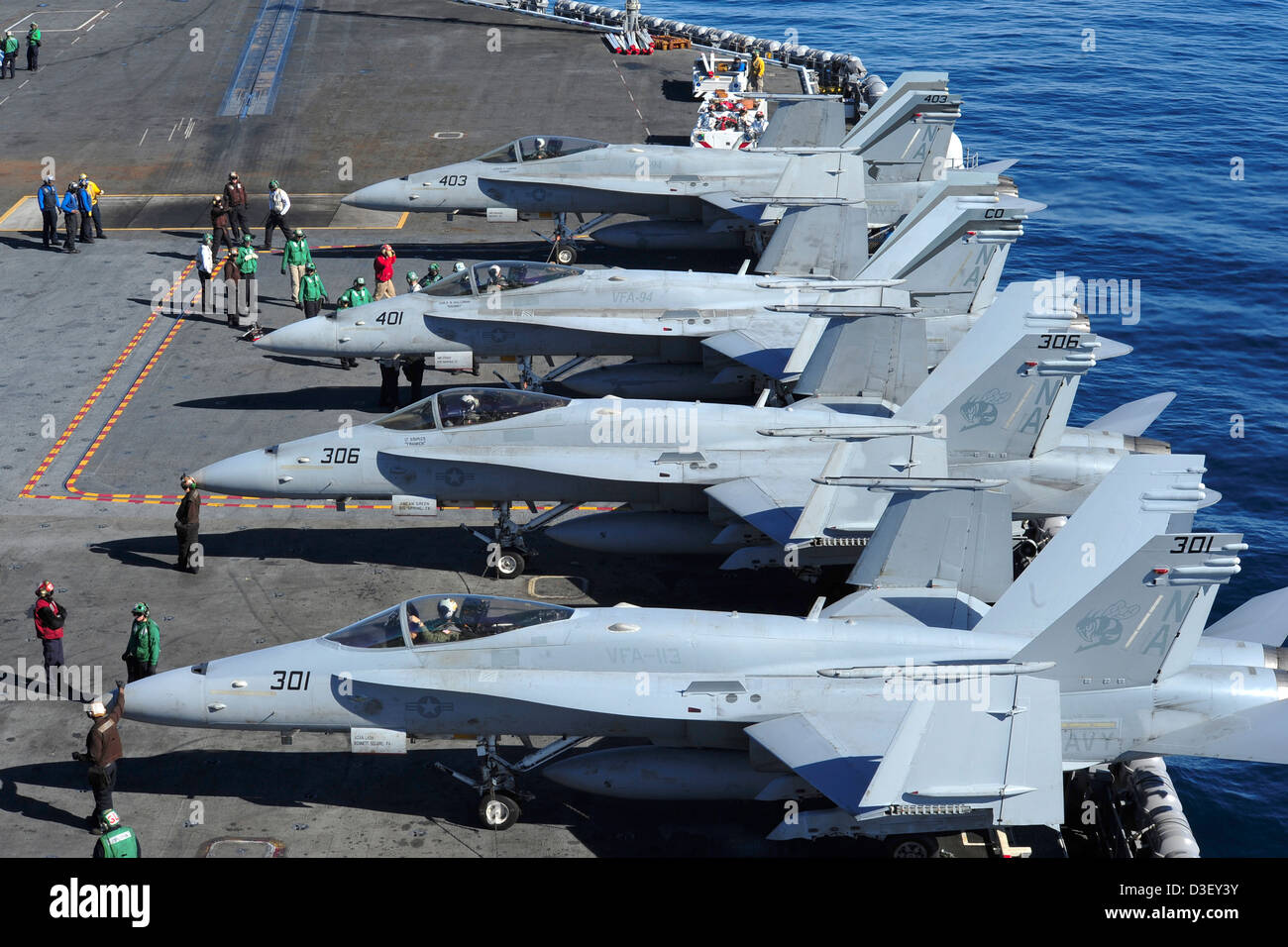 us-navy-fa-18c-hornets-line-up-before-take-off-from-the-us-navy-nimitz-D3EY3Y.jpg