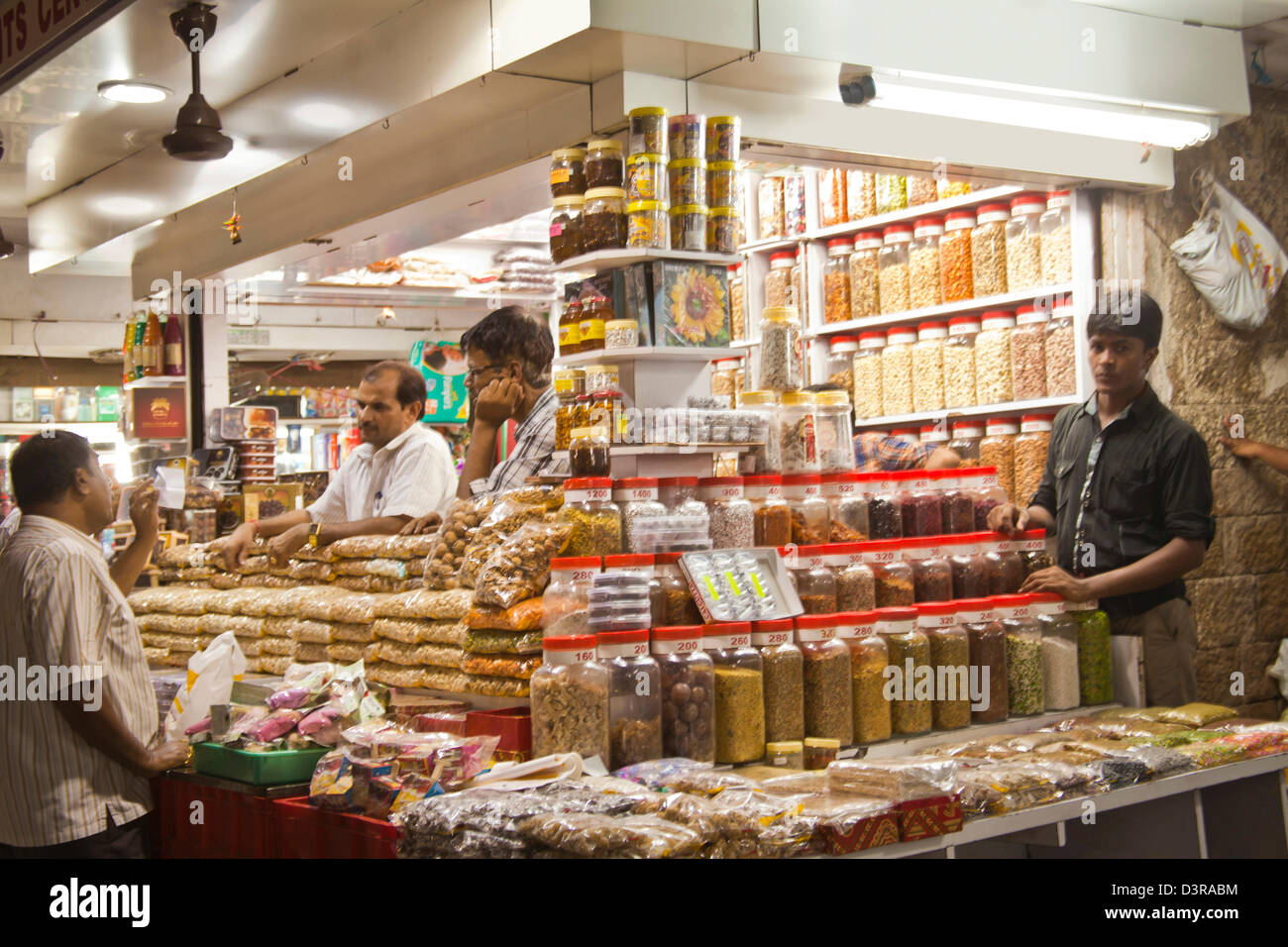 People at a dry fruits store on the street, Crawford Market, Mumbai