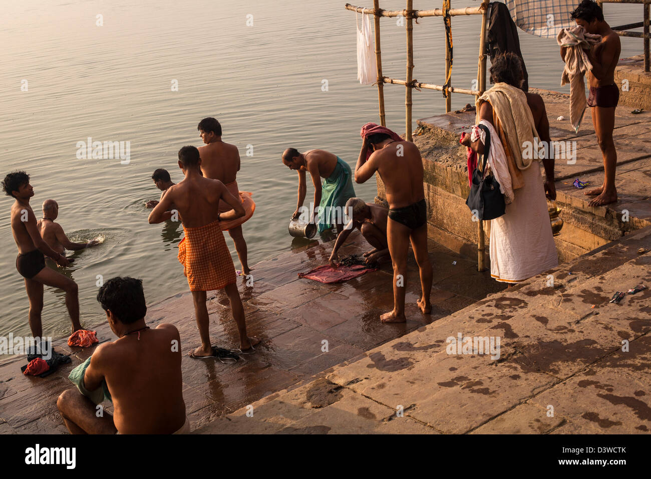 Indian Men Bathing In The Ganges River Varanasi India Stock Photo