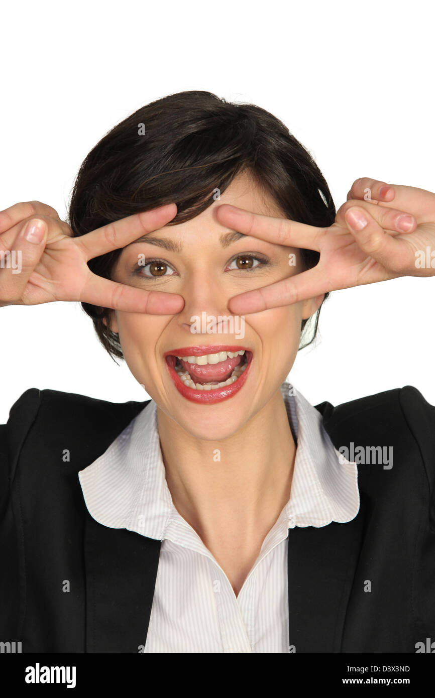 Brunette Pulling Silly Face Stock Photo Alamy