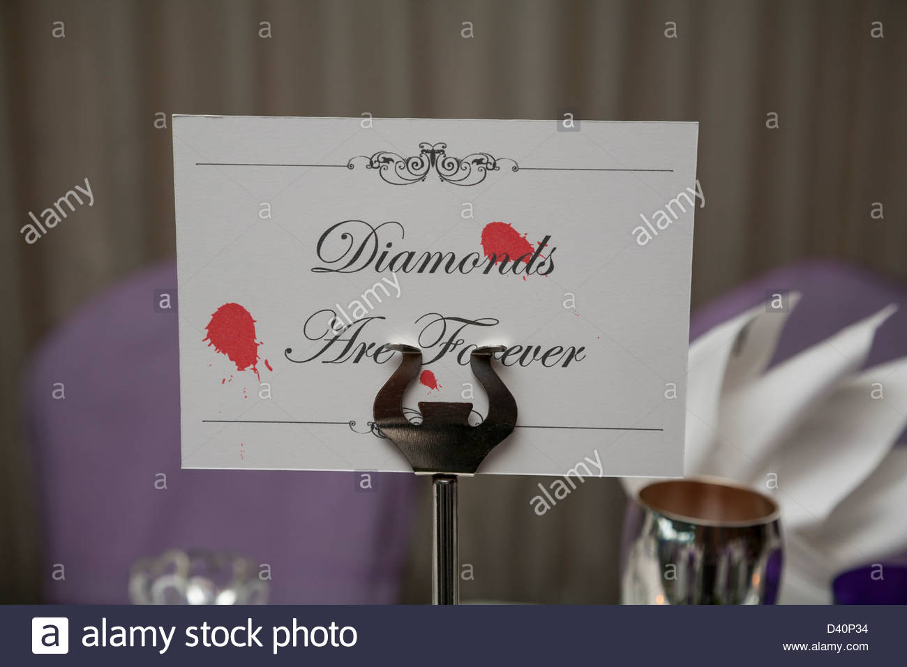 Table Names Wedding table name card on a stand at a "james bond" themed wedding stock Table Names Wedding table name card on a stand at a "james bond" themed wedding stock