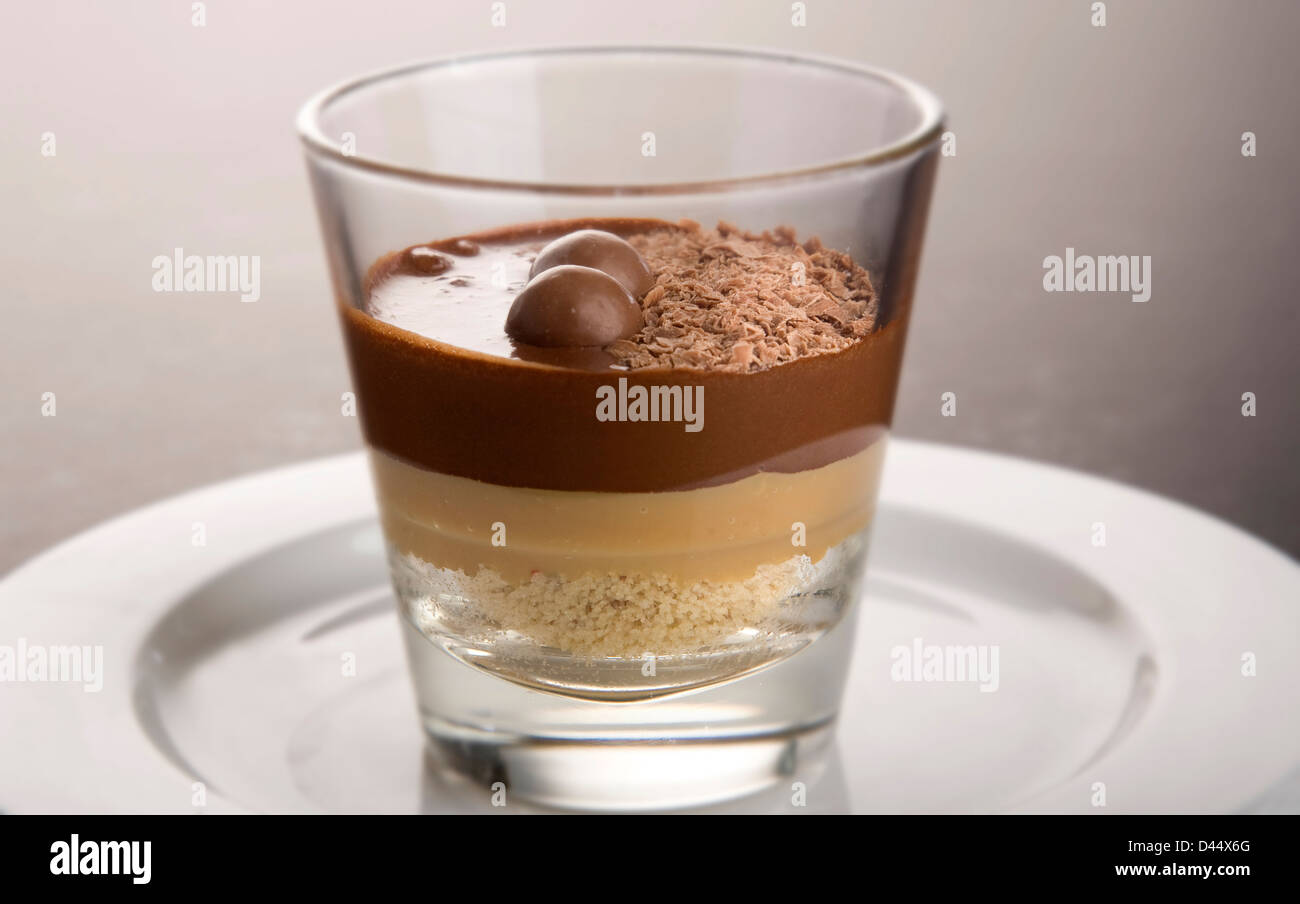 glass served desserts i layered chocolate dessert served in a glass on a white plate stock photo royalty free image glass served desserts i layered chocolate dessert served in a glass on a white plate stock photo royalty free image
