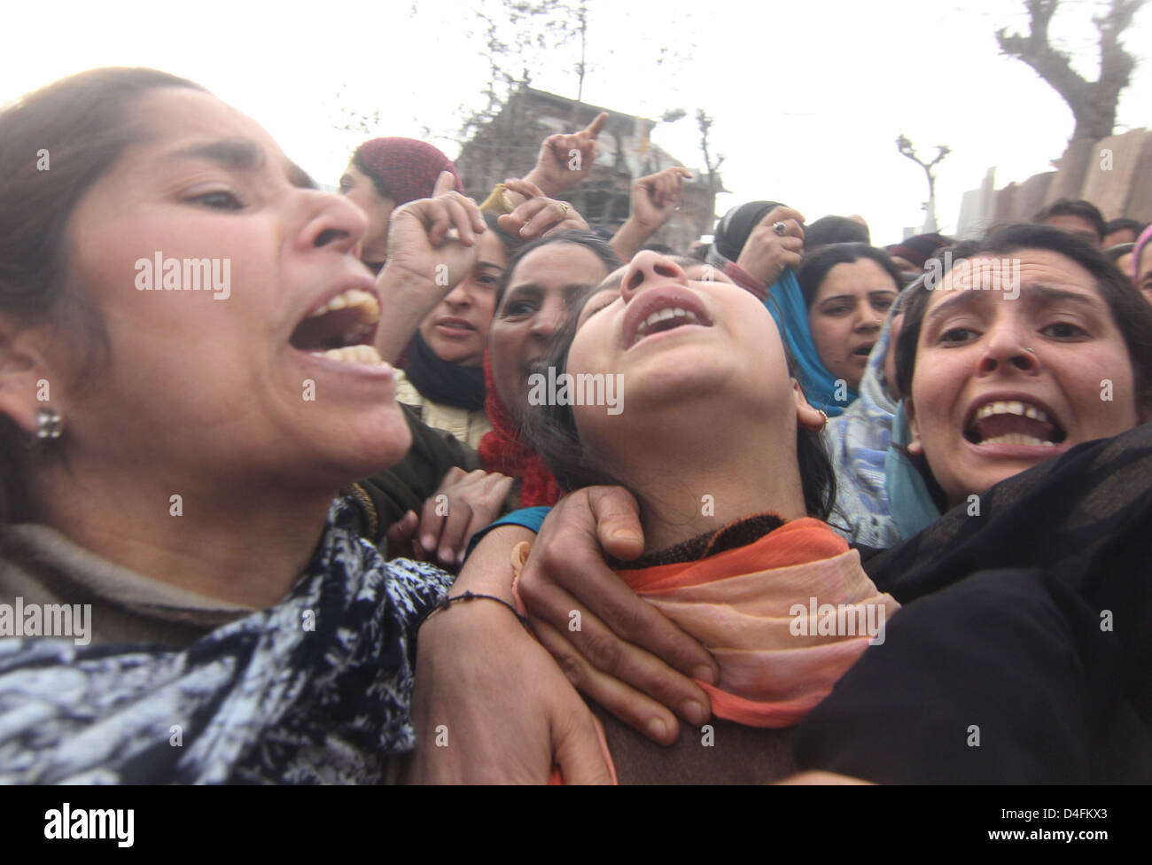 March 13, 2013 - Kashmiri Muslim women mourn during the funeral procession of Altaf Hussain Wani in srinagar, the summer capiatl of indian kashmir on ... - march-13-2013-kashmiri-muslim-women-mourn-during-the-funeral-procession-D4FKX3