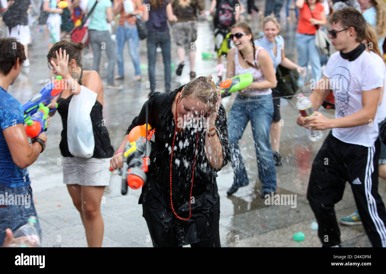 Participants in a water fight ?flashmob? enjoy themselves on Stock