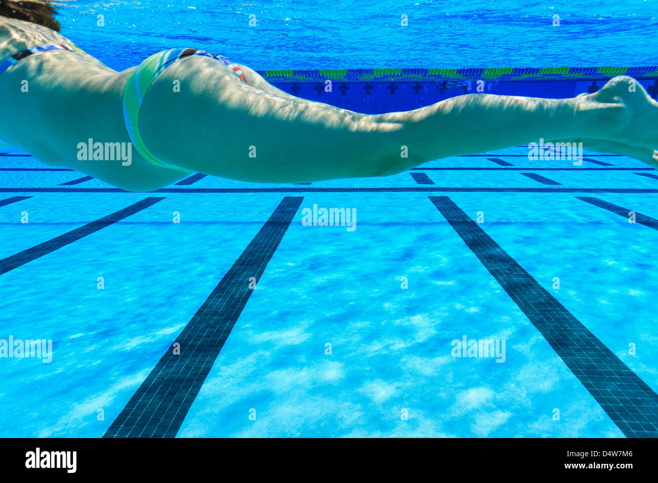 Pregnant woman swimming in pool Stock Photo, Royalty Free Image