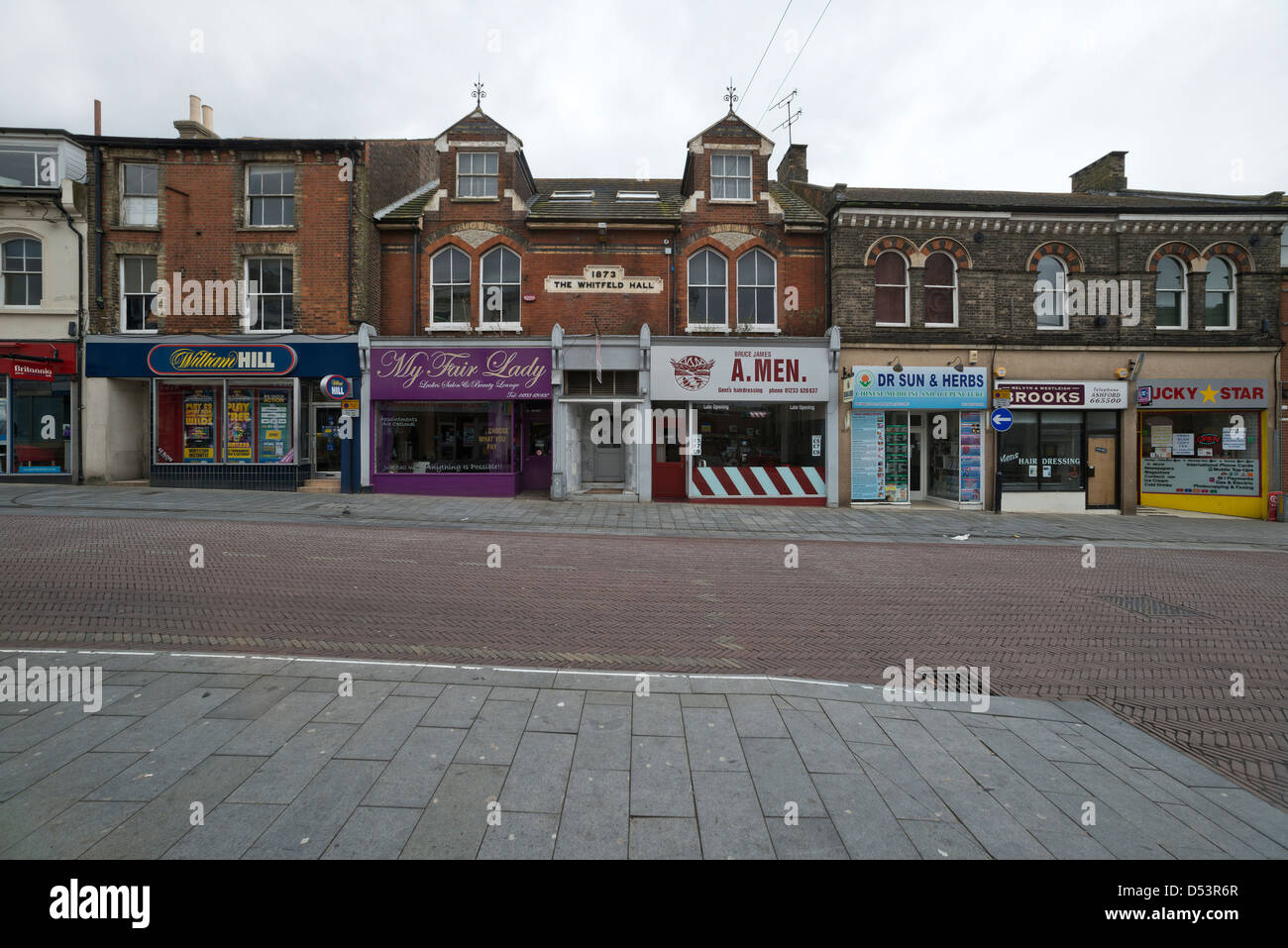 a-row-of-shops-bank-street-ashford-kent-england-stock-photo