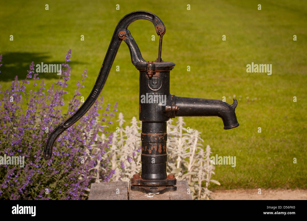 Old Fashioned Hand Water Pump In Garden Stock Photo Royalty Free inside Old Fashioned Hand Water Pump