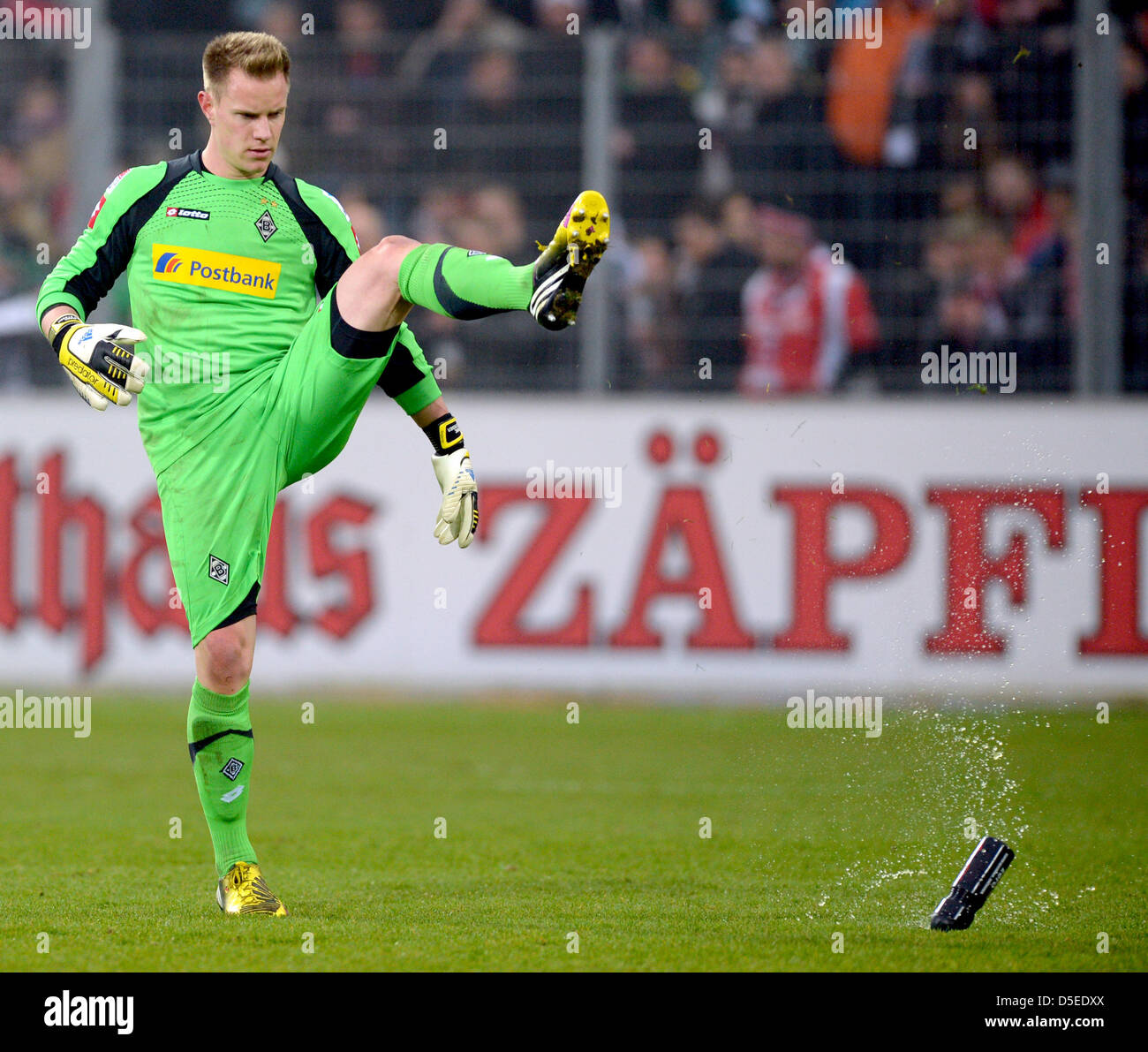 Goal keeper MarcAndre ter Stegen of Mönchengladbach angrily kicks a