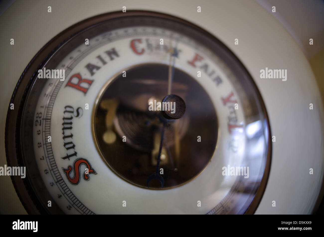 Old classic collectible aneroid barometer used for measuring and Stock