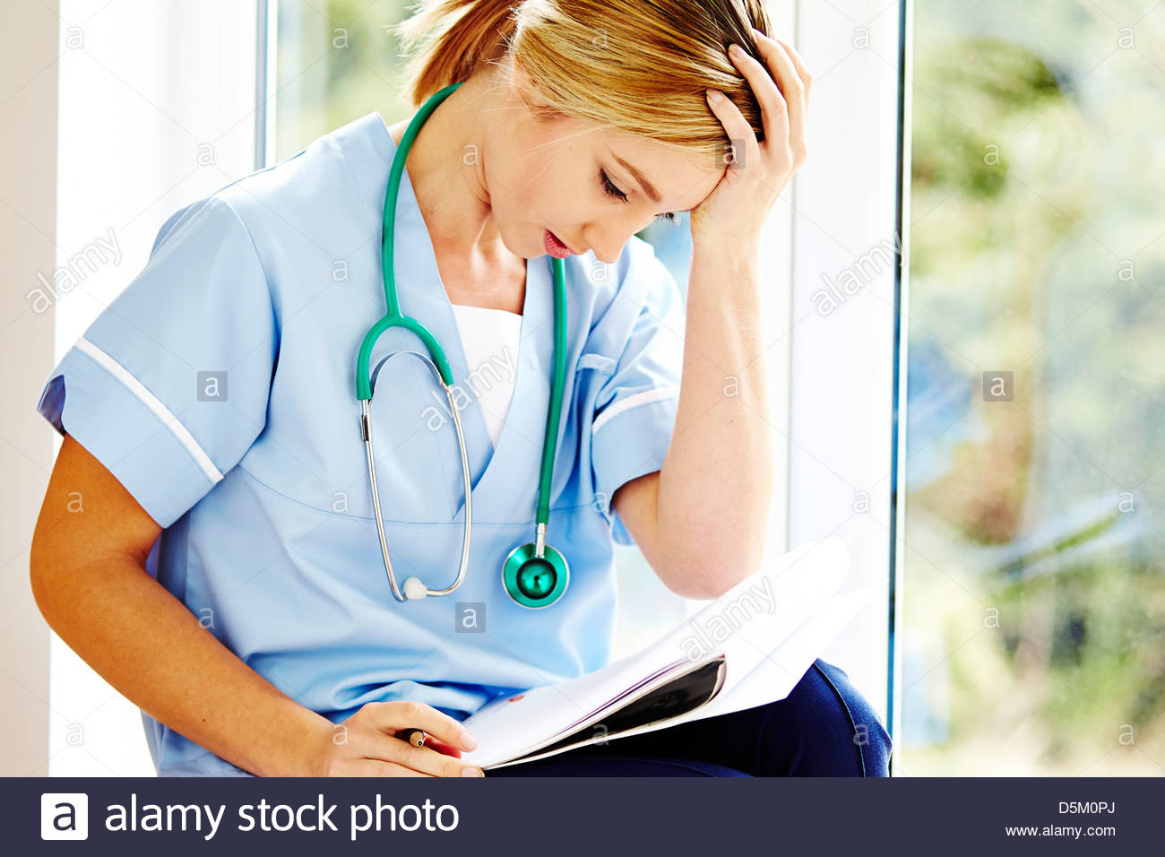 Tired nurse Stock Photo, Royalty Free Image 55144058 Alamy