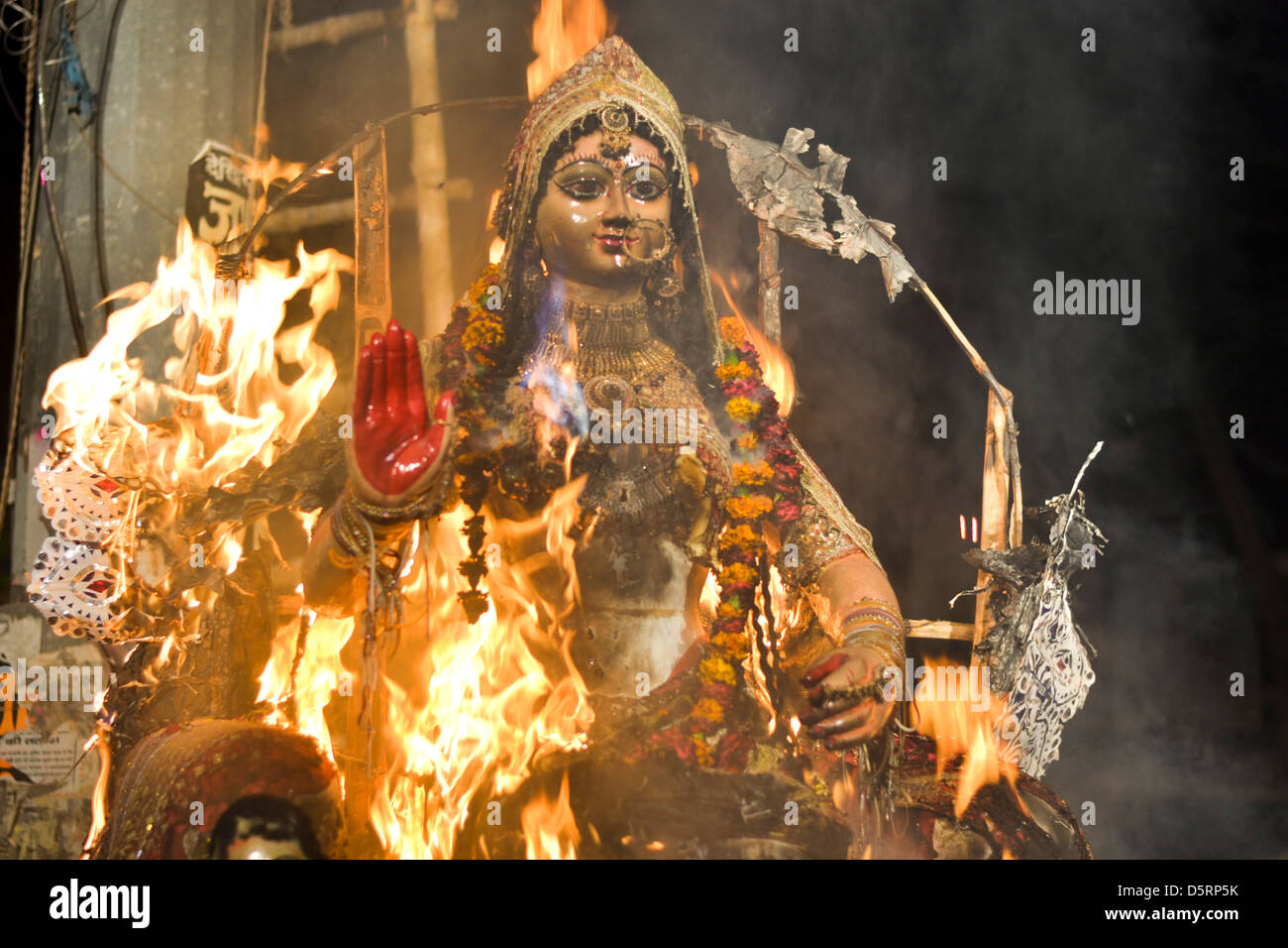 holi burning is associated with the demoness