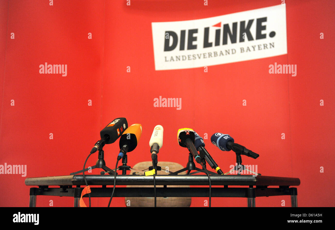 microphones-are-pictured-on-a-table-before-a-press-conference-at-the-D61A5H.jpg