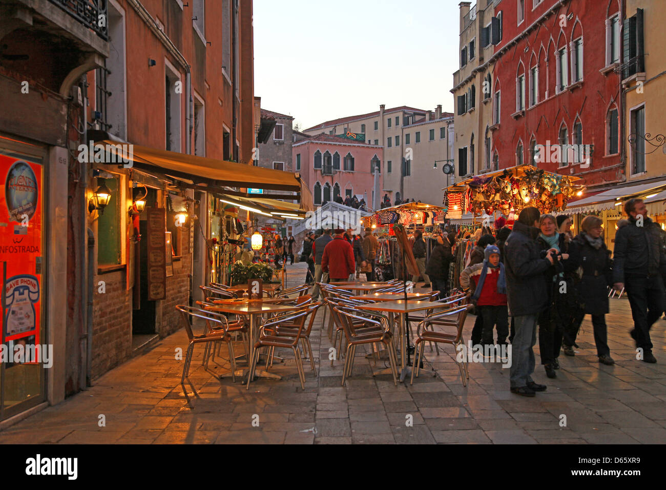 Market stalls and pavement cafés on one of the back streets of Venice Stock Photo, Royalty Free