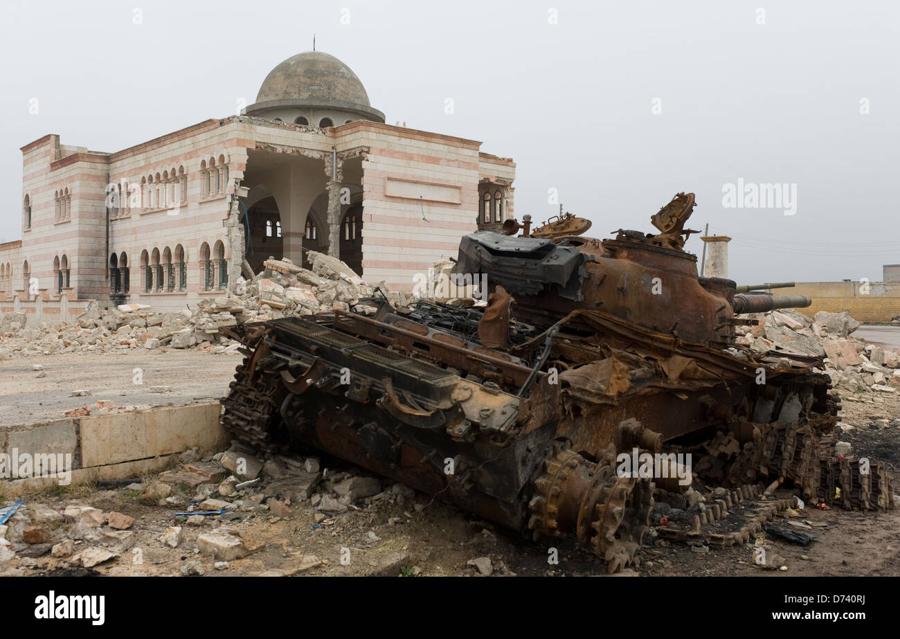 Destroyed mosque and a burned tank, Azaz, Syria Stock Photo, Royalty