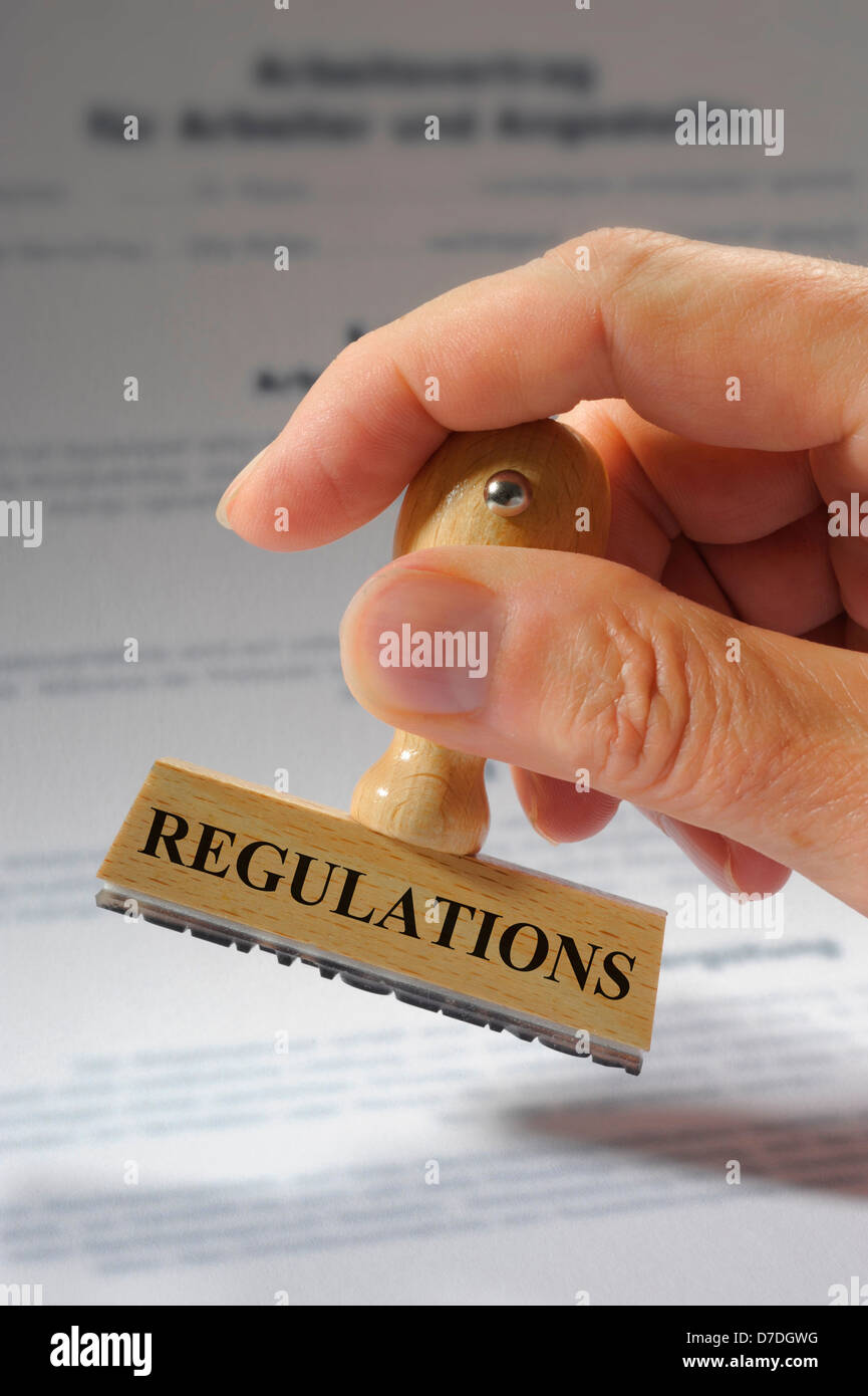 regulations marked on rubber stamp Stock Photo, Royalty Free Image