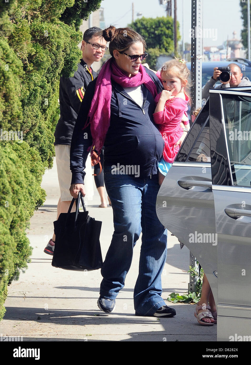 A heavily pregnant Jennifer Garner leaving a ballet class with her
