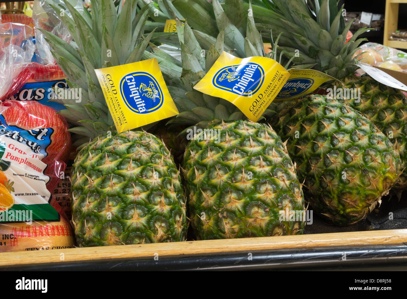 Pineapples on display in a grocery store Stock Photo 57067508 Alamy