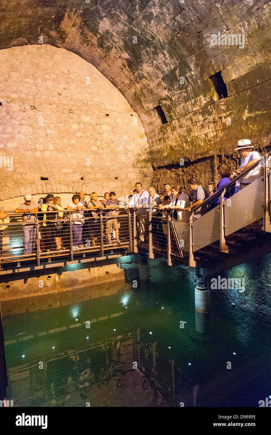 Israel , Old City Jerusalem , tourists , water cistern of the Tunnels