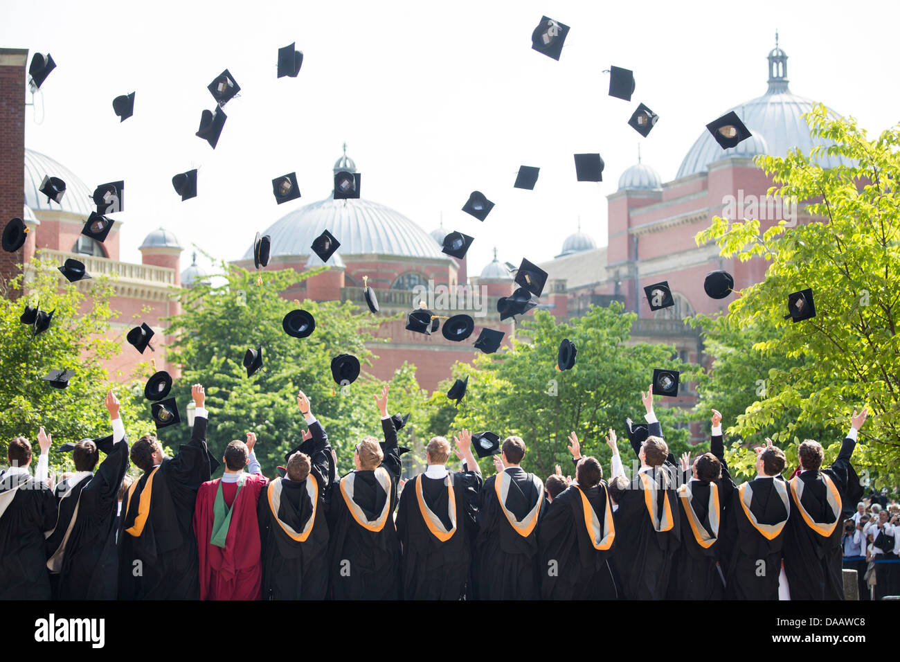 Graduates throw their caps in the air at Birmingham University, UK