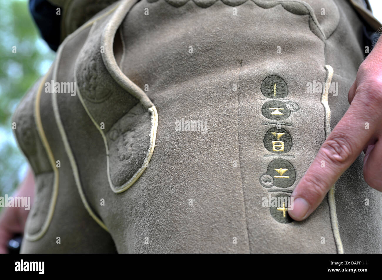 A Lodenfrey employee presents high-tech lederhosen with an ...