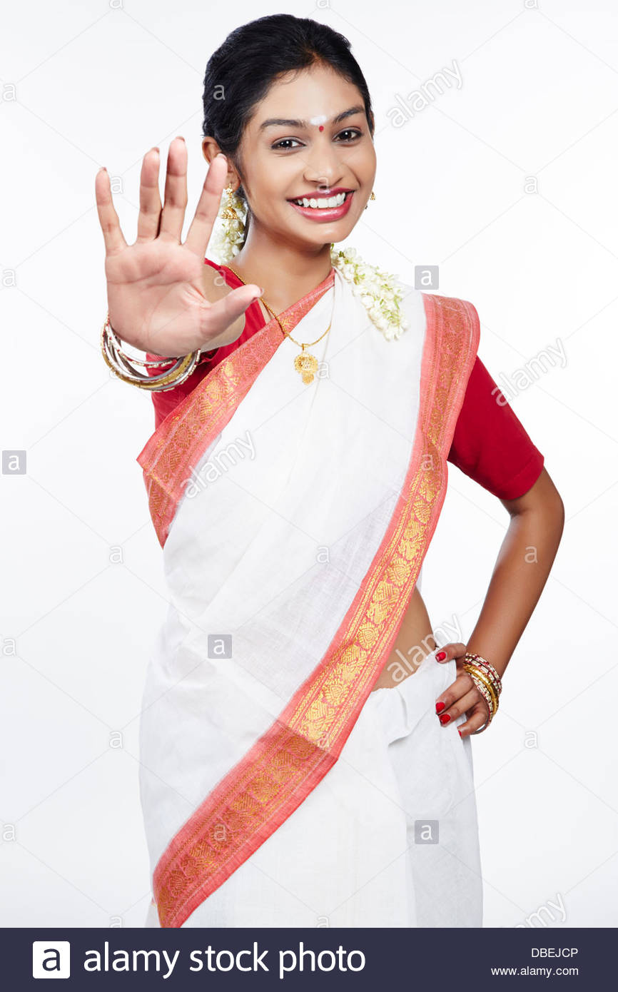 portrait-of-a-south-indian-woman-making-