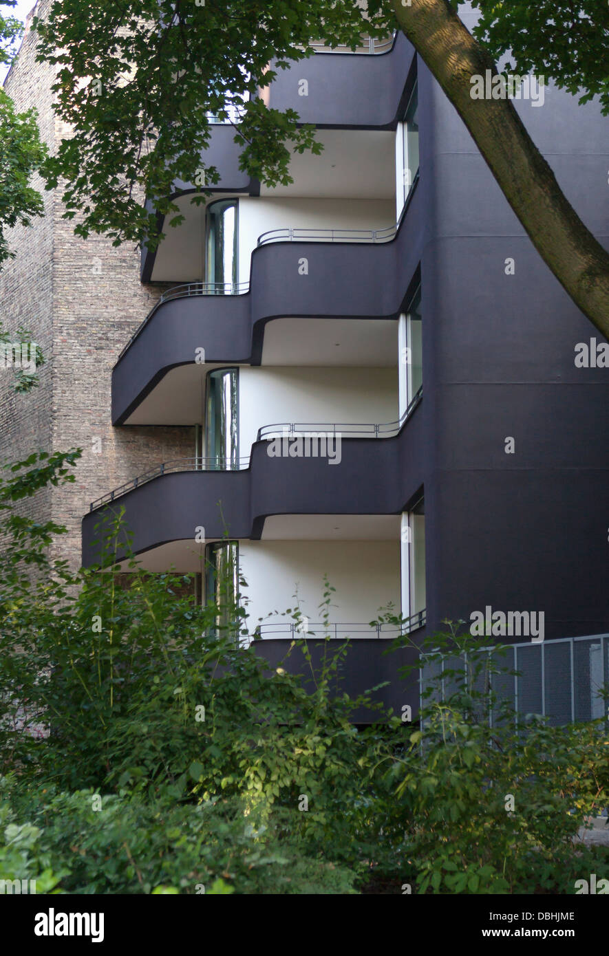 Sinuous curved black and white modern apartment building mitte berlin