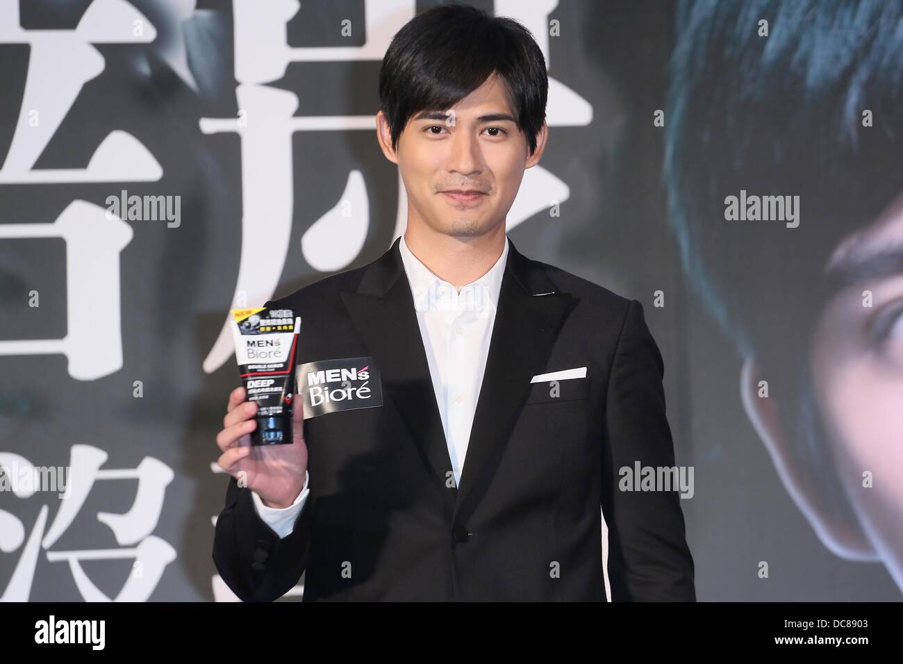 Stock Photo - Actor Vic Chou attends promotion activity of Biore in Taipei,China on Friday August 9,2013
