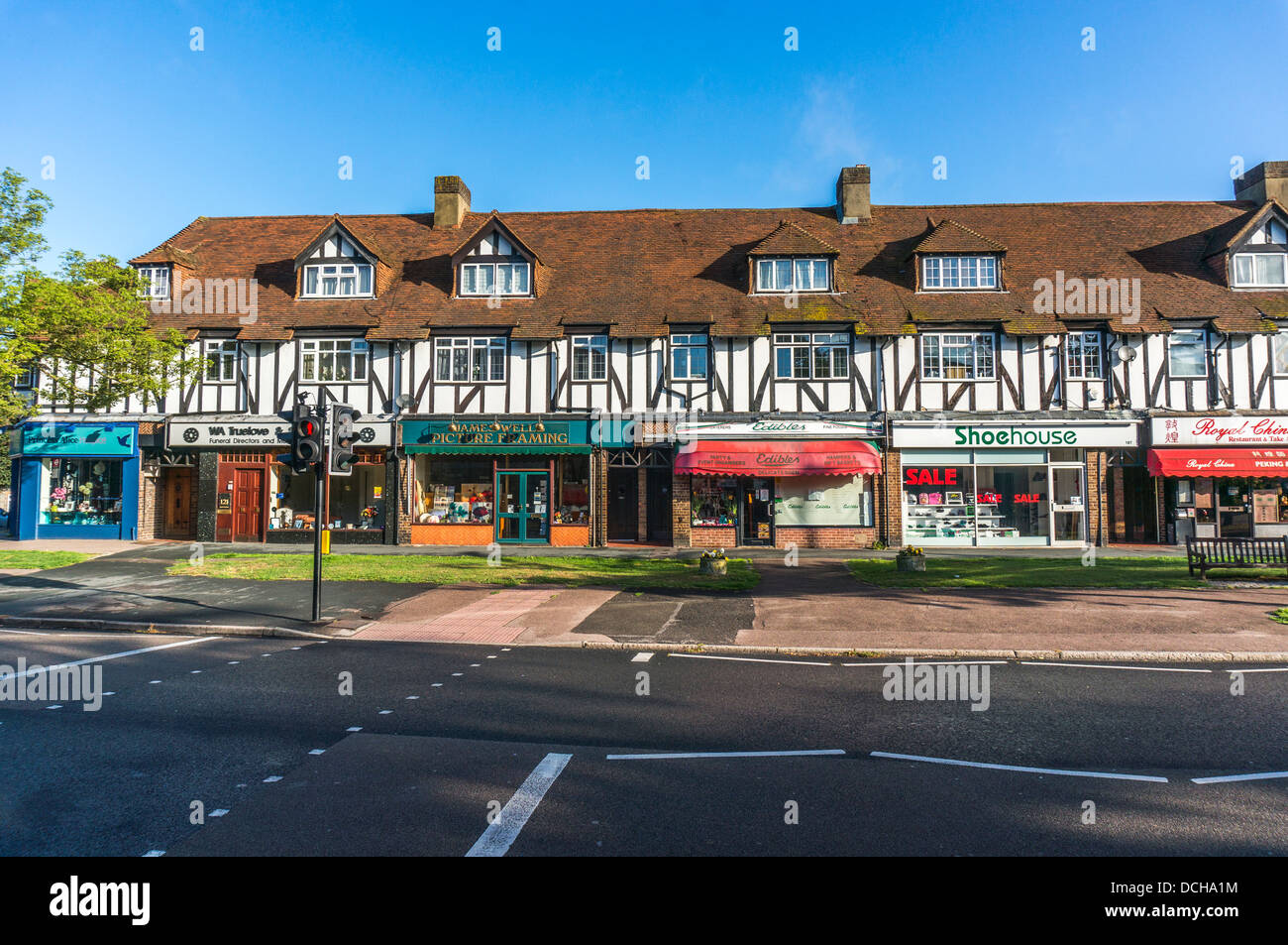 Parade of shops on Banstead village High Street, on a quiet Sunday