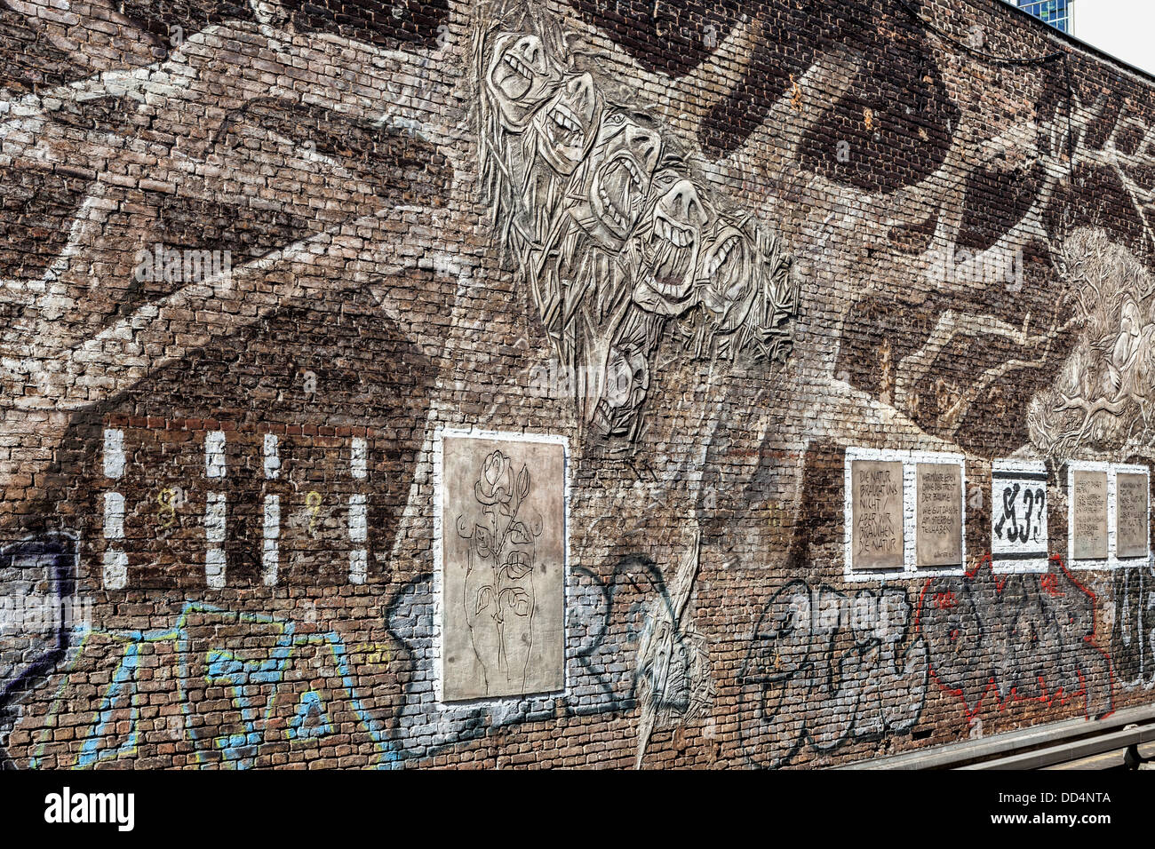 Brick Wall Art art work, quotations and graffiti on a brick wall at the db stock Brick Wall Art art work, quotations and graffiti on a brick wall at the db stock