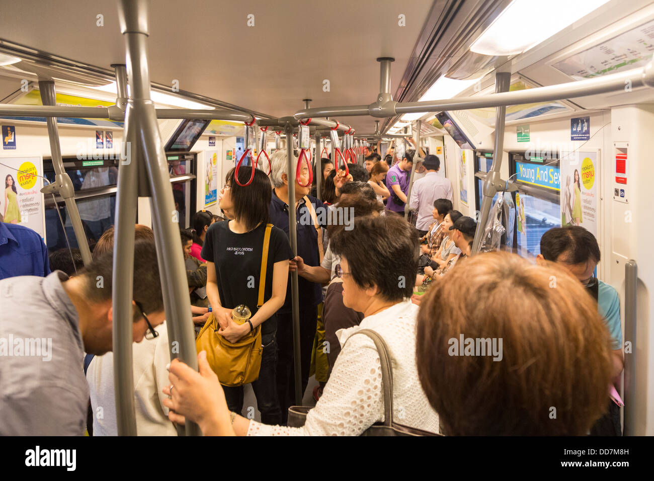 People Inside The Bts Skytrain In Bangkok The Capital City Of