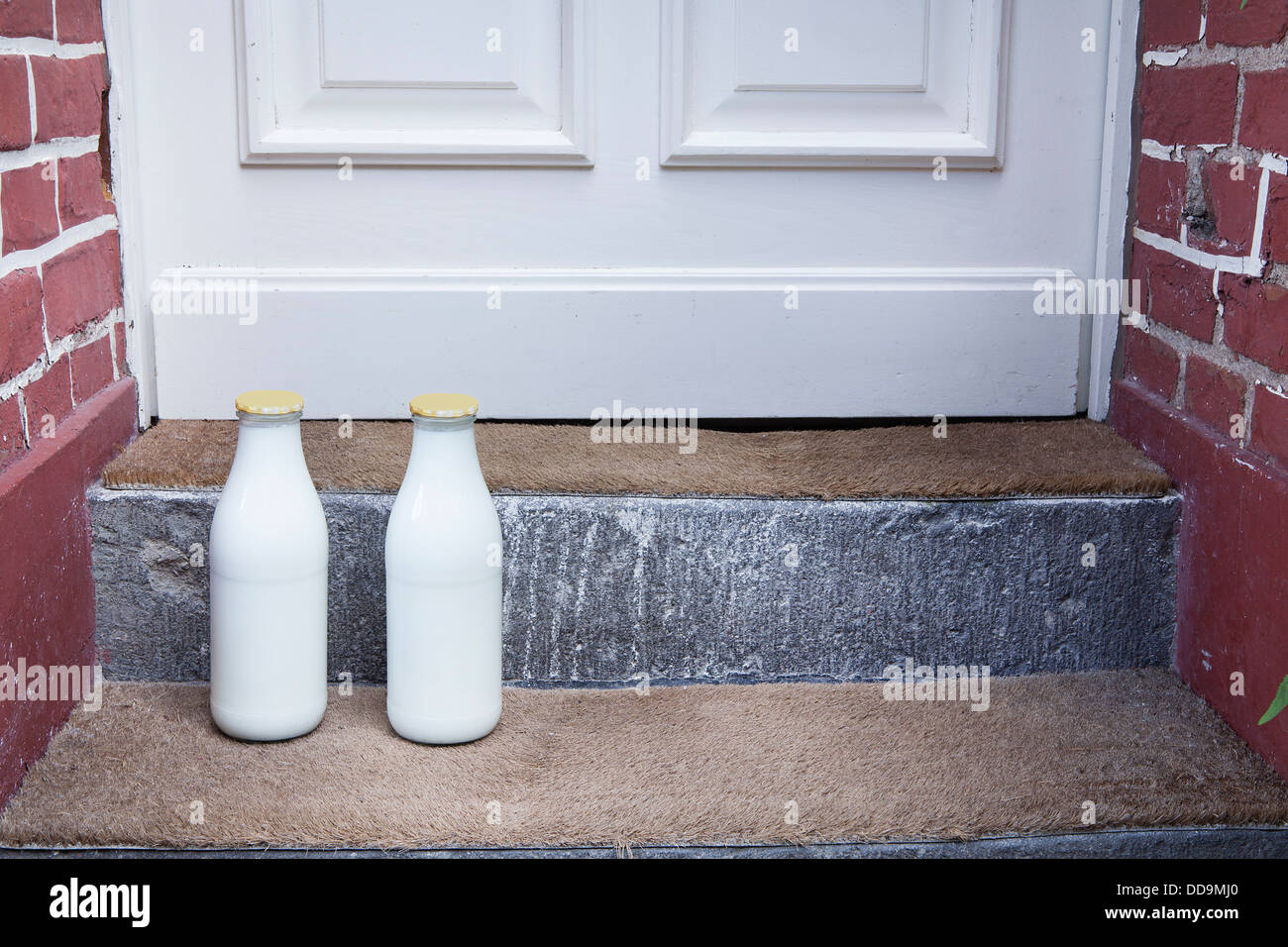 Milk bottle on doorstep Stock Photo, Royalty Free Image: 59835384 - Alamy