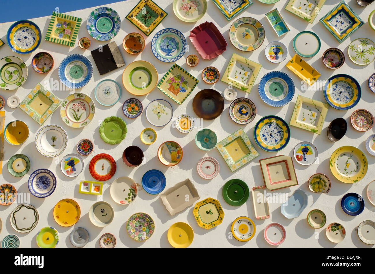 Portuguese pottery and ceramic shop with plates on wall, Cape St Stock