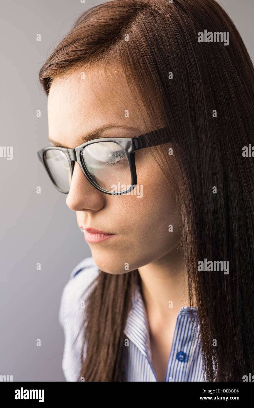Day Dreaming Brunette With Glasses Posing Stock Photo Alamy
