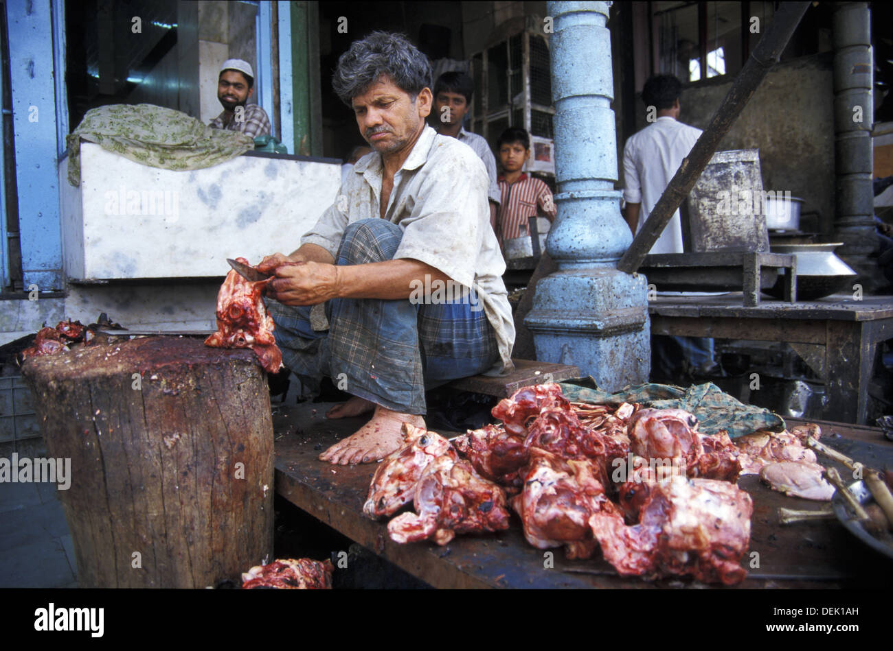 Indian Predator: The Butcher Of Delhi Butcher in Chandni Chowk market, New Delhi. India Stock Photo: 60654457
