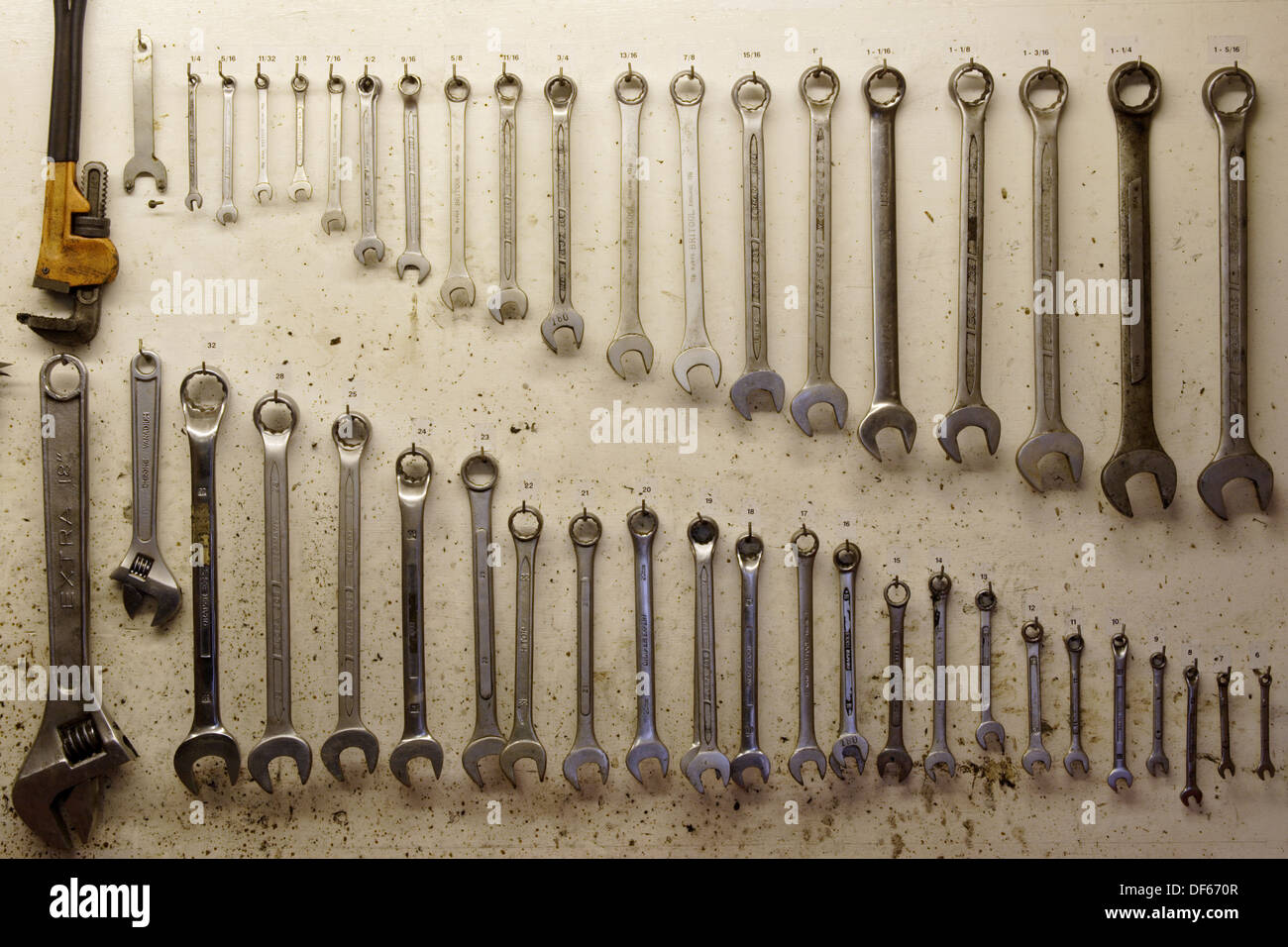 Complete spanner tool set on wall of Stock Photo, Royalty Free